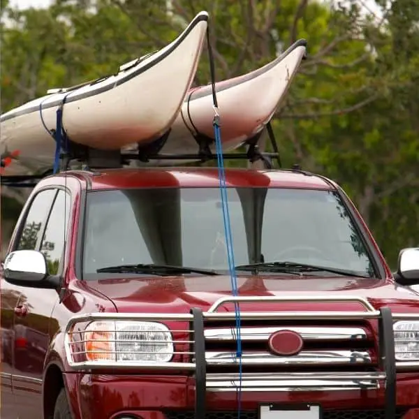 setting up a kayak on a truck